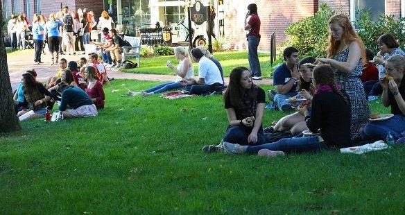 Students on the lawn outside the Athletic Center
